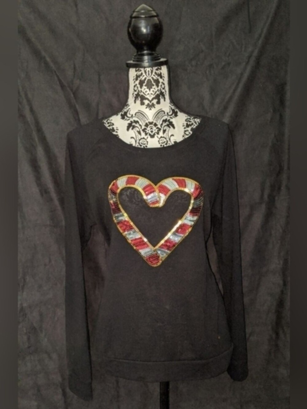 Black Long-Sleeve Top with Multicolor Heart Embellishment
